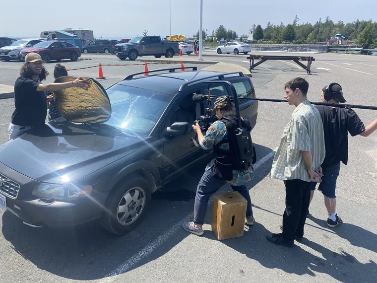 The Bruce Peninsula crew filming around the road trip car